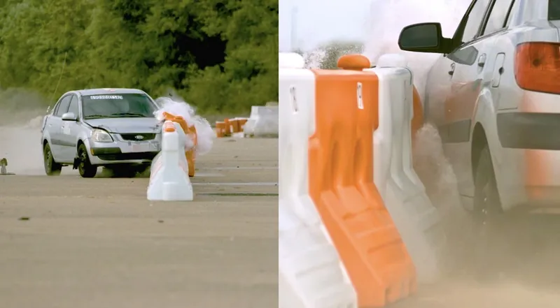 Crash test of a car hitting a line of WATERCADE barriers